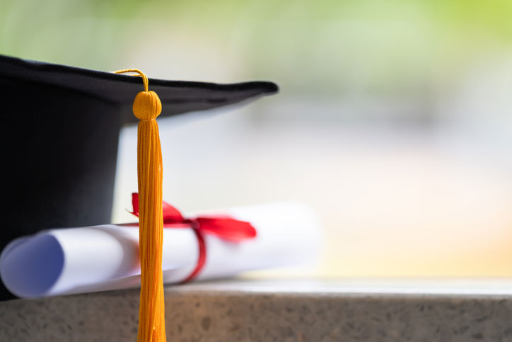 diploma and grad cap