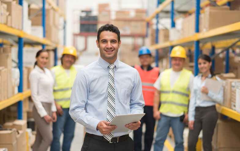 supply chain manager on the job with other workers