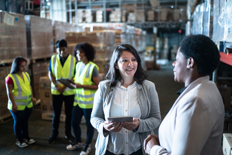 group talking in the warehouse