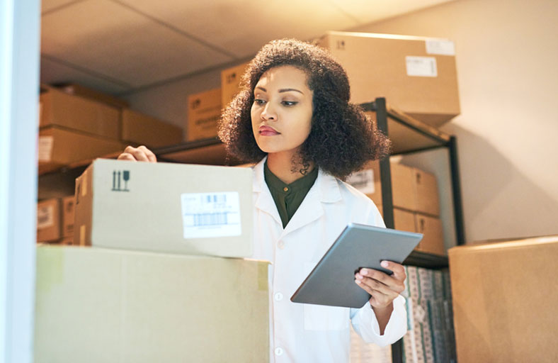 employee in pharmacy storeroom