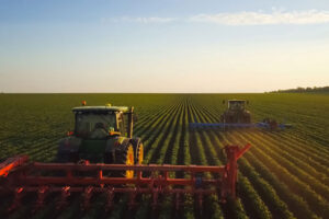 tractors in the soybean fields