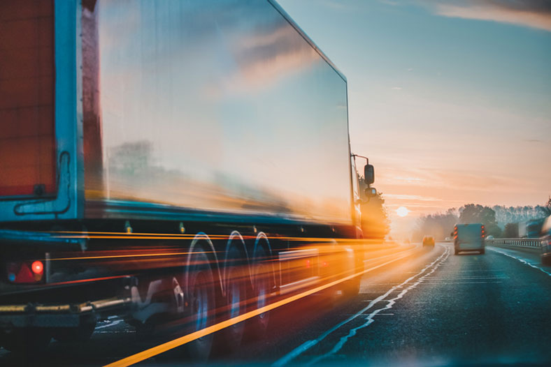 semi accelerating on the highway