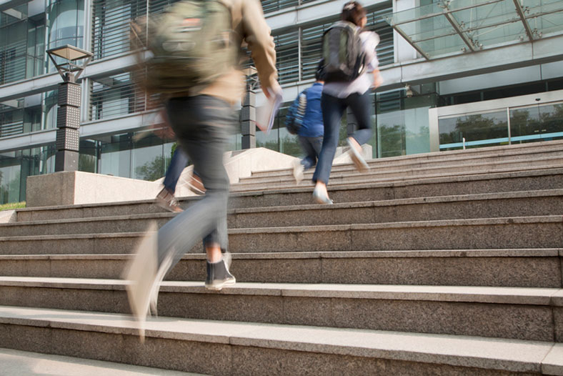 students running to class